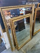 A modern gilt framed bevelled wall mirror and one other, the largest 127cm