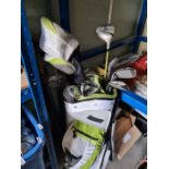 A 'Wilson' golf bag having Wilson clubs and others