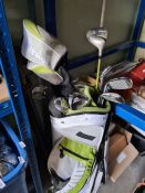 A 'Wilson' golf bag having Wilson clubs and others
