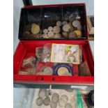 A metal moneybox containing mixed coinage, some 19th Century