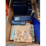 Box of cigarette cards and cigarette card magazines