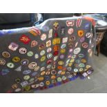 A vintage Scouting blanket, 1960s onwards for the Boy Scouts of America containing over 100 badges a