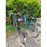 A ladies Falcon Explorer 10 bicycle and one other gents bicycle