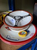 Of motoring interest; a Beswick bowl in form of steering wheel made for Les Leston, motoring rugs an
