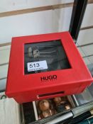 A modern Hugo Boss mans belt in box