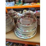 A quantity of vintage Wedgwood dinnerware decorated roses, to include a tureen, vegetable dishes and