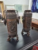 A pair of large Japanese bronze cylindrical vases on 3 rat shaped feet the body decorated birds and