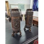 A pair of large Japanese bronze cylindrical vases on 3 rat shaped feet the body decorated birds and