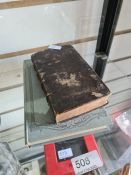 A mid 18th Century, leather bound book titled "Catechismus A D Ordinandos" and one other book on Mas