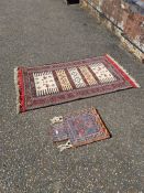 An old Afghan grain bag and a Kelim rug having 5 central rows with a Geometric border 160cm x 93cm