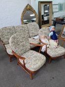 A 1980s Ercol stickback 3 seat settee with pair of matching armchairs
