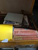 A vintage case of various hardback books, etc