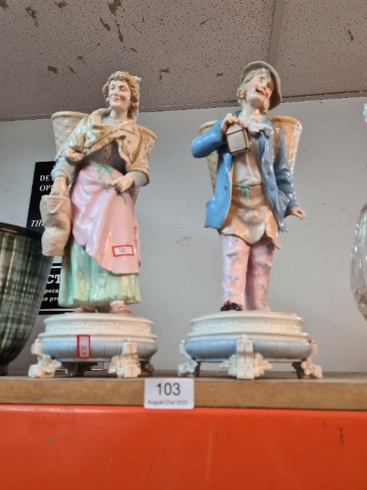 A pair of early 20th Century German porcelain figures