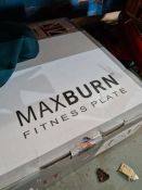 A used Maxburn fitness plate (boxed) and a travel iron