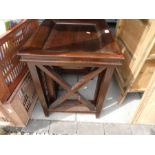 A nest of 2 mahogany coffee tables