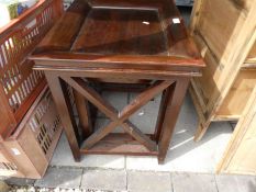 A nest of 2 mahogany coffee tables