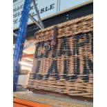 An old Wicker laundry basket labelled Chapmans