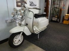 A Lambretta L.i 125, 1962. A fully restored example in very good condition, seen running complete wi