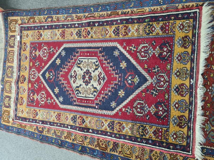 Two Turkish hand woven geometric style rugs 193 x 105cm