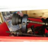 An old metal work lathe with accessories and motor