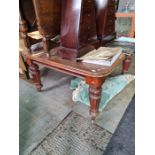 A Victorian Mahogany extending dining table on turned fluted legs, no leaves, 133cm