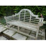 A teak bench of Lutyens style