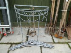 A wrought iron console table and other iron work