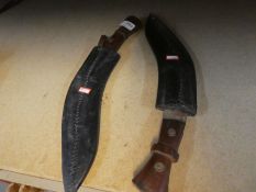 Two similar Kukri knives