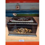 A Victorian black lacquer jewellery casket having Mother of Pearl inlaid decoration