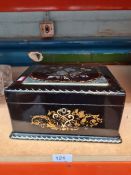 A Victorian black lacquer jewellery casket having Mother of Pearl inlaid decoration