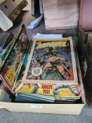 A quantity of vintage comics mainly American including DC and Marvel, a small quantity of football p