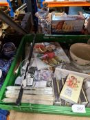 A crate of mixed new goods including napkins, bowls, glassware, china, etc