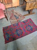 An antique caucasian rug having geometric design, and three others