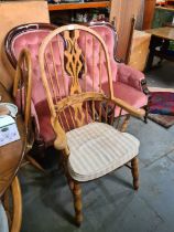 A modern beech stick back armchair on turned legs