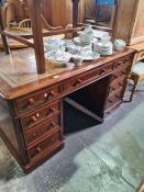 A Victorian mahogany twin pedestal desk having 9 drawers, 137cm. The height of the desk is 75cm