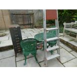 A garden table and two chairs, a metal filing cabinet