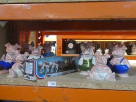 Ten various Nat West Pigs (two sets of five) and a Corgi Queen's Silver Jubilee State Landau (one pi