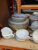 A quantity of Royal Worcester 'Imperial' dinner ware having gilt decoration