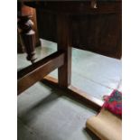 An antique elm refectory style table having two flaps overall length 177cm