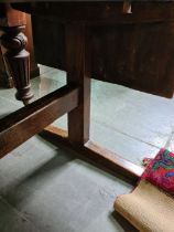 An antique elm refectory style table having two flaps overall length 177cm