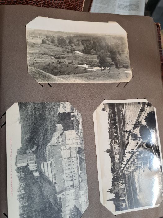 Two albums of old postcards, mainly of French Churches and interiors but also others, also two Frenc