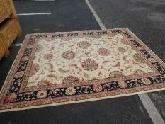 A modern rug having floral design with black border, 290cm x 228cm