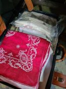 A suitcase of vintage Irish linen, lace and similar