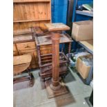 A Victorian burr Walnut Canterbury What Not having one drawer and a walnut pedestal having fluted co