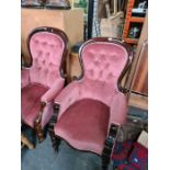 Two similar Victorian mahogany button back arm chairs