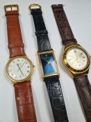 Swatch Irony wristwatch and two Raymond Weil
