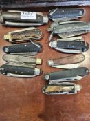 A collection of folding knives, some Military to include some 19th Century examples