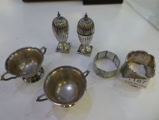 A pair of Indian Colonial Silver salts in the form of trophy cups. On raised pedestal circular bases