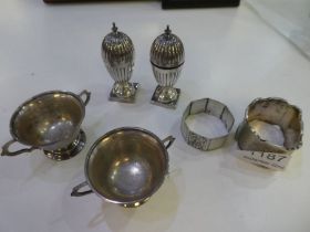 A pair of Indian Colonial Silver salts in the form of trophy cups. On raised pedestal circular bases