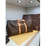 Louis Vuitton Monogram luggage holdall, Serial Number DU4101. The item is in very good condition, wi